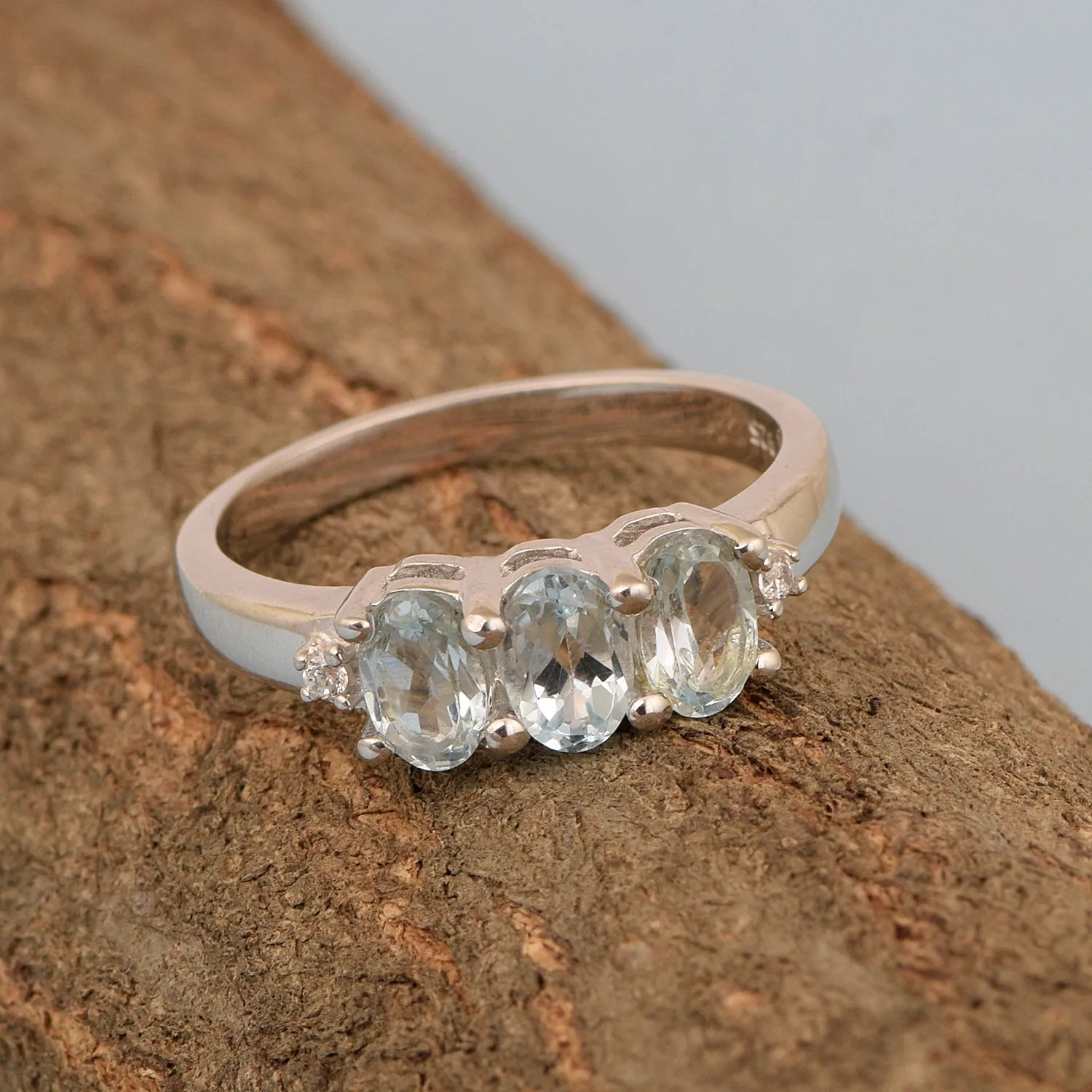 925 Sterling Silver Three-Stone Oval 1.35 Ctw Blue Topaz Women's Ring