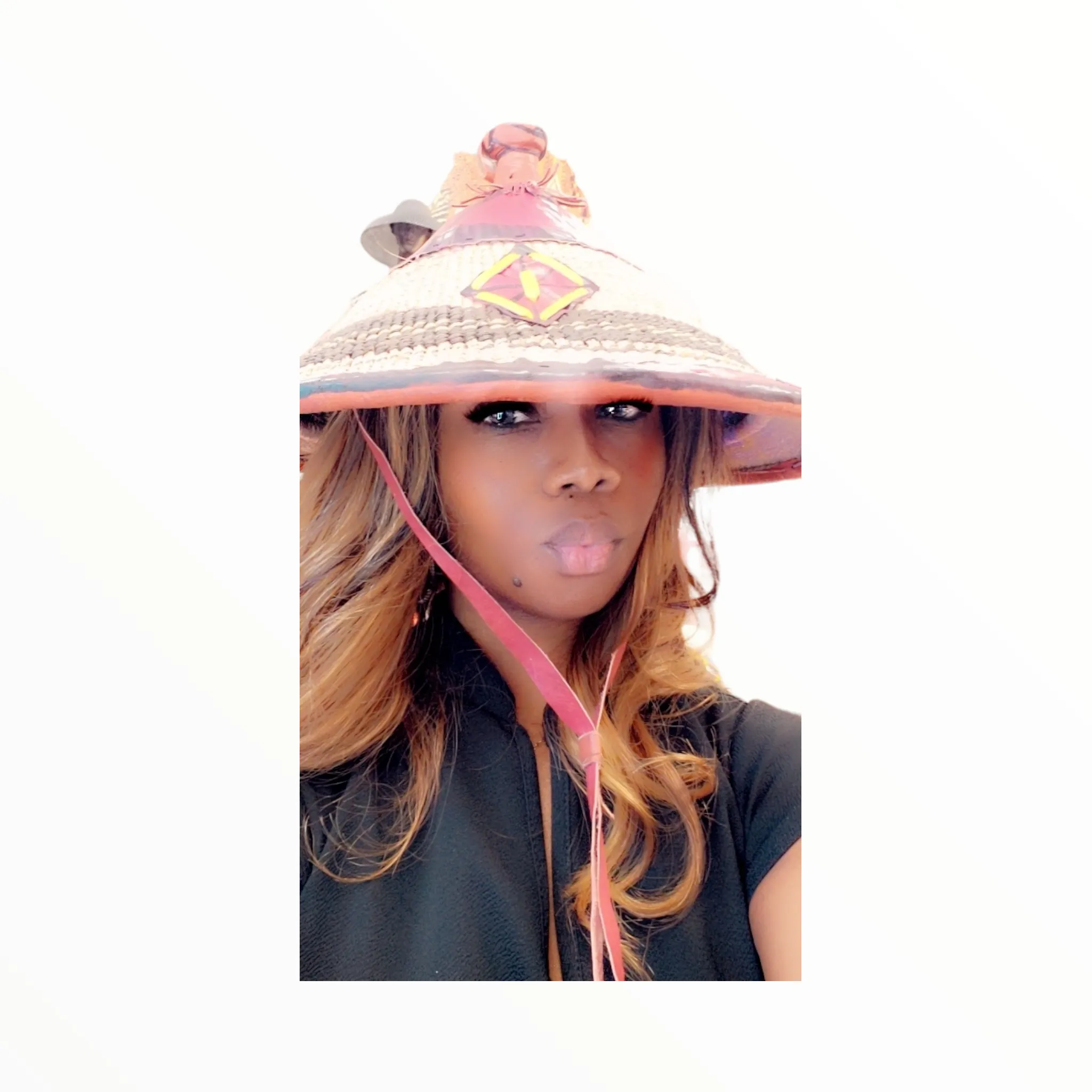 Fulani Ceremonial Hat with red leather accents | Geri's Bluffing Boutique