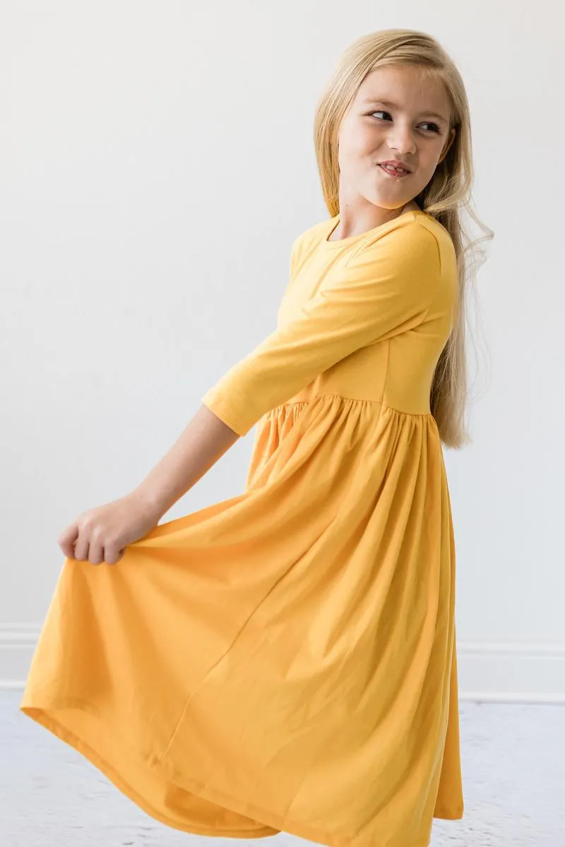 GOLDEN YELLOW TWIRL DRESS