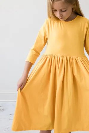 GOLDEN YELLOW TWIRL DRESS