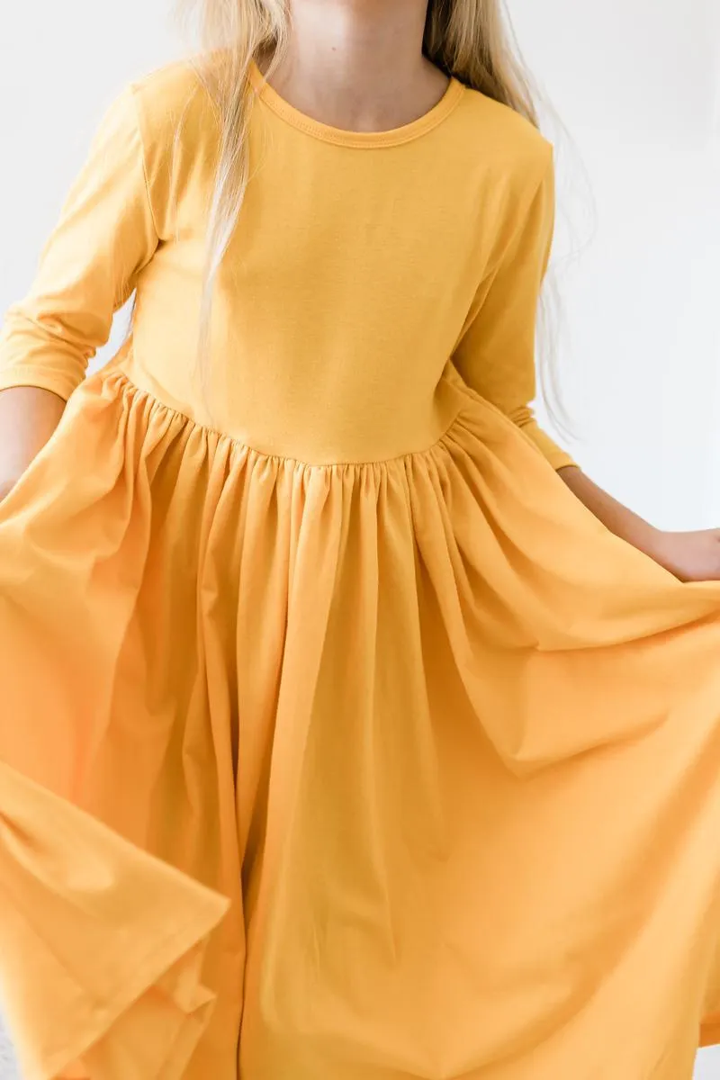 GOLDEN YELLOW TWIRL DRESS